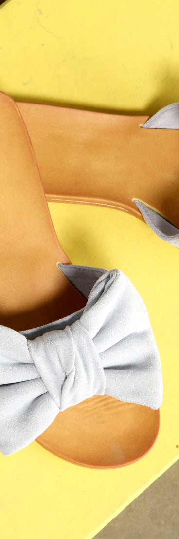 Sealed And Chic Faux Suede Bow Sandals are chic ladies' shoes to complete your best 2023 outfits. They come in a variety of trendy women's shoe styles like platforms and dressy low-heels, & are available in wide widths for better comfort.