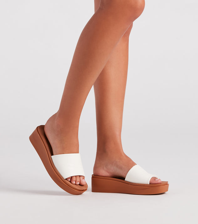 Coastal Babe Slip-On Wedge Sandals are chic ladies' shoes to complete your best 2023 outfits. They come in a variety of trendy women's shoe styles like platforms and dressy low-heels, & are available in wide widths for better comfort.