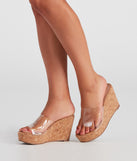 Pretty Clear PVC Cork Wedges are chic ladies' shoes to complete your best 2023 outfits. They come in a variety of trendy women's shoe styles like platforms and dressy low-heels, & are available in wide widths for better comfort.