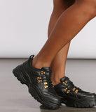 Pop of Glam Chunky Bungee Lace Sneakers are chic ladies' shoes to complete your best 2023 outfits. They come in a variety of trendy women's shoe styles like platforms and dressy low-heels, & are available in wide widths for better comfort.