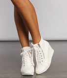 Step It Up Faux Leather Wedge Sneakers are chic ladies' shoes to complete your best 2023 outfits. They come in a variety of trendy women's shoe styles like platforms and dressy low-heels, & are available in wide widths for better comfort.