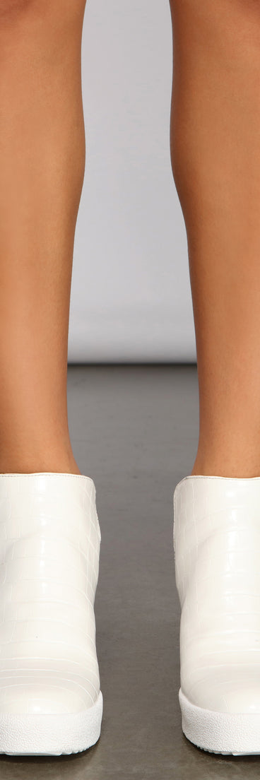 Next Level Croc Wedge Sneakers are chic ladies' shoes to complete your best 2023 outfits. They come in a variety of trendy women's shoe styles like platforms and dressy low-heels, & are available in wide widths for better comfort.